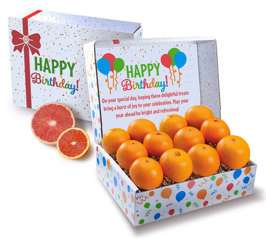 Occasion Gift Boxes filled with fresh oranges, decorated for a Happy Birthday celebration.