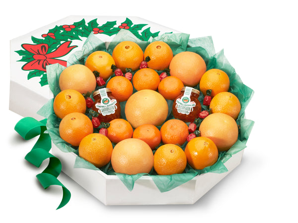 Citrus gift of oranges and grapefruit shaped as a holiday wreath.